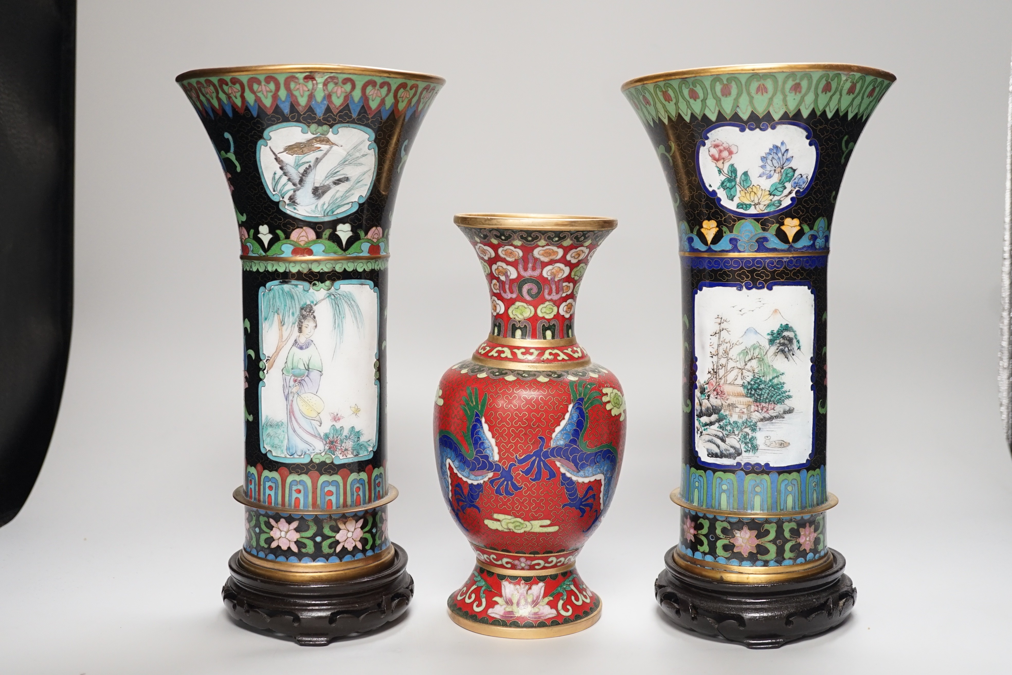 A pair of Chinese cloisonné enamel beaker vases and a dragon vase, pair of vases 27cm